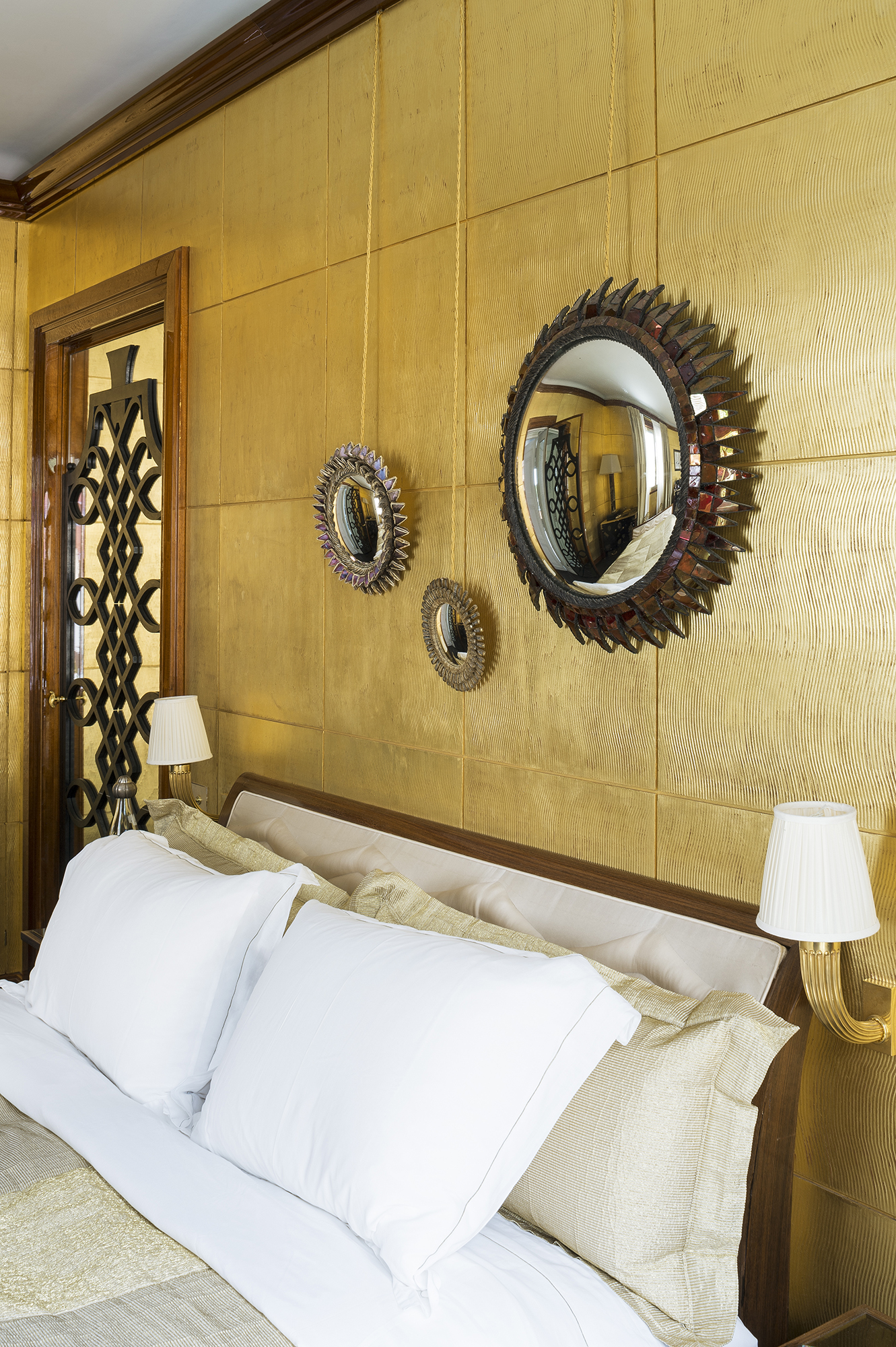 Gilded contemporary bedroom in Monaco